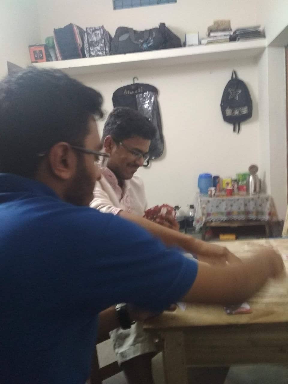কার্ড চলত নিয়মিত। ছবিতে দুই বিশিষ্ট কার্ড খেলোয়াড় রাশেদ ও অভি।